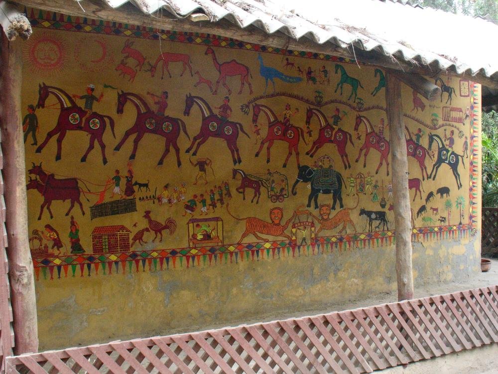 Pithora wall painting showing the horse procession motif, photographed at the Crafts Museum, New Delhi