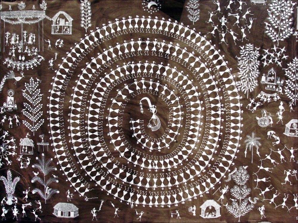 Classic white-on-red Warli mural showing geometric human and animal figures